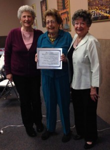 Ruth Cowan receiving award