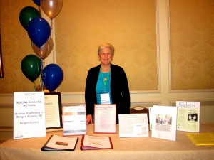 Co-President Ann Levenstein at our Human Trafficking exhibit at the "Show Me" Showcase