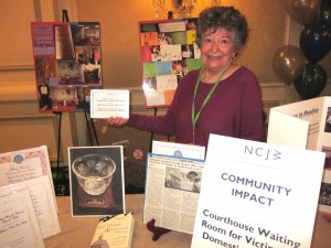 Co-President Gladys Laden displaying the Section's Community Impact Award which we won for our Bergen County Courthouse Waiting Room