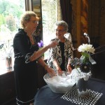 Elaine Adler picks raffle winner