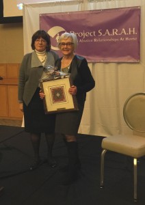 Marcia receiving award from Elke Stein, Consortium Director